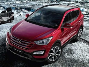 Hyundai Santa Fe lateral frontal rojo